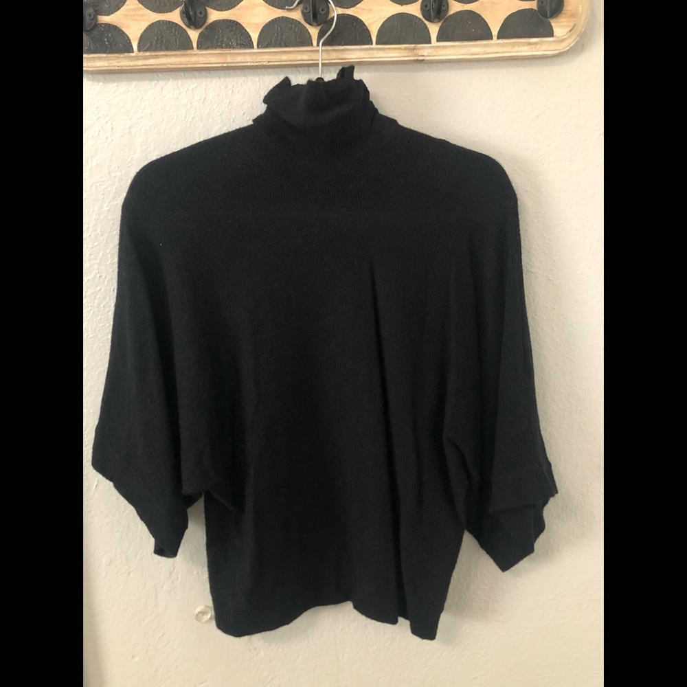 Black turtle neck sweater